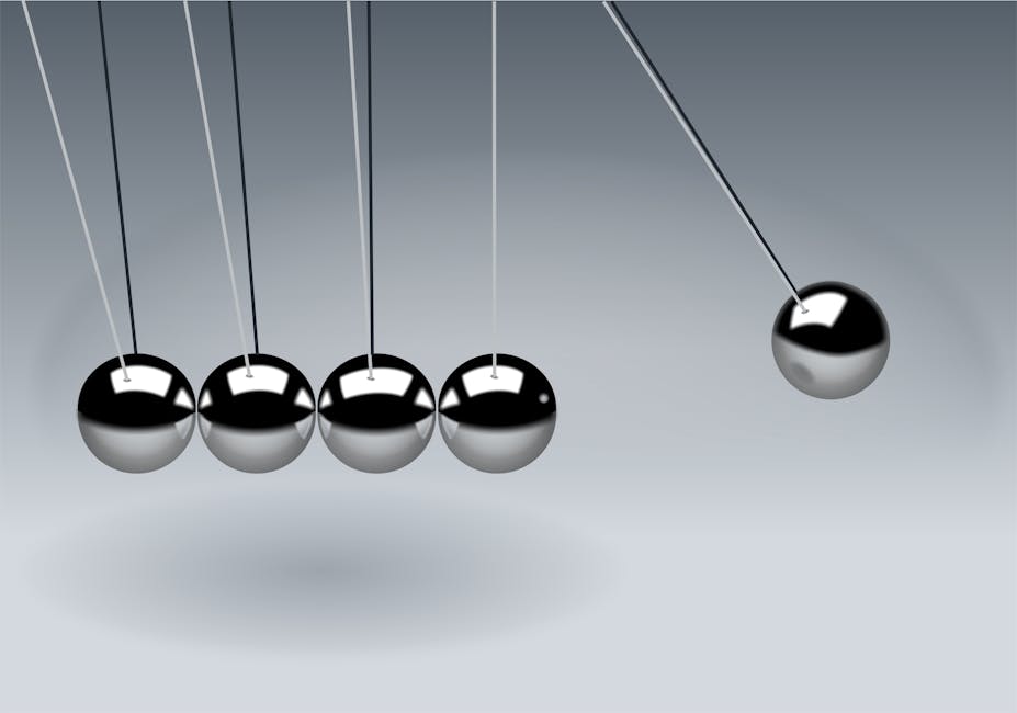 Dynamic illustration of Newton's Cradle showing motion and reflection concepts in physics.
